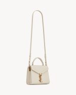 Cassandra Mini Top Handle Bag In Grain De Poudre Embossed Leather - Image 7